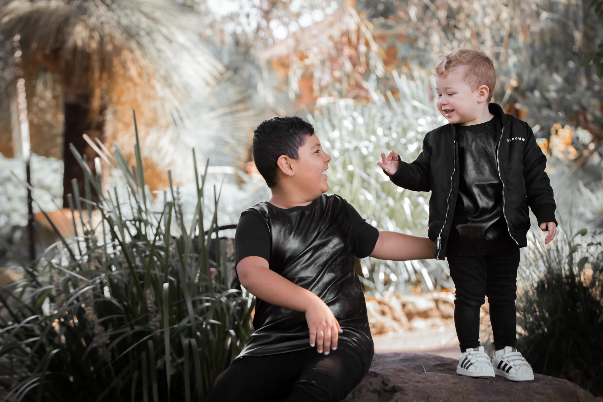Father and son family portrait outdoors photographed by Royale Photography