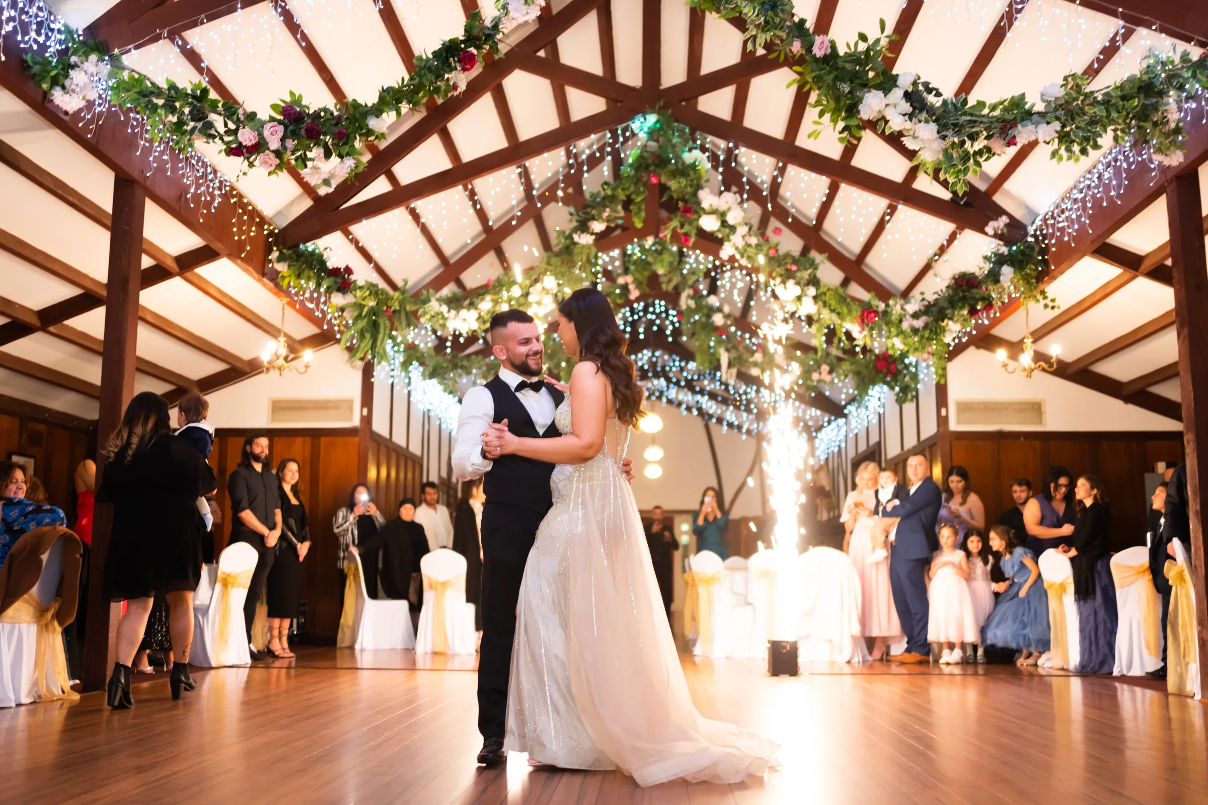 Wedding first dance in a reception hall photographed by Royale Photography